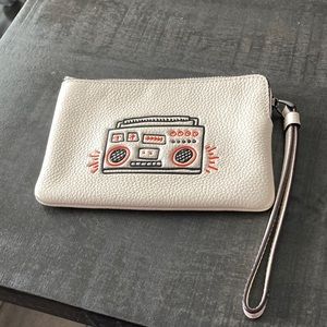 Coach X Keith Haring small wrist wallet.